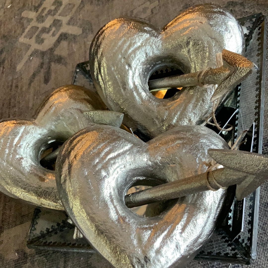 Metal heart with Cupid arrow